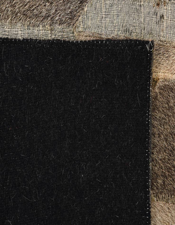 Detail image of  2' 1 x 3' Cowhide Rug