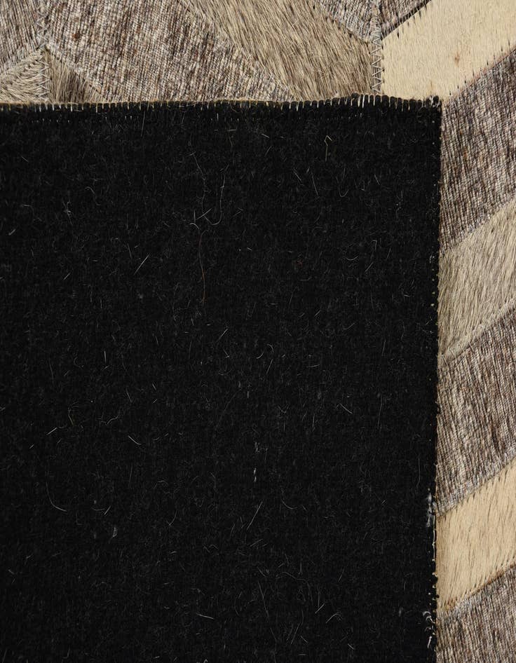 Detail image of  2' 1 x 3' 1 Cowhide Rug
