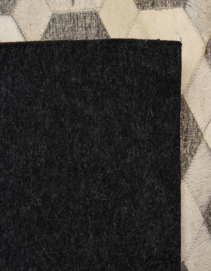 Detail image of  5' 5 x 7' 9 Cowhide Rug