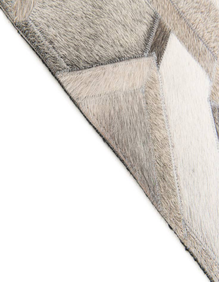 Detail image of  5' 1 x 7' 11 Cowhide Stocks Rug