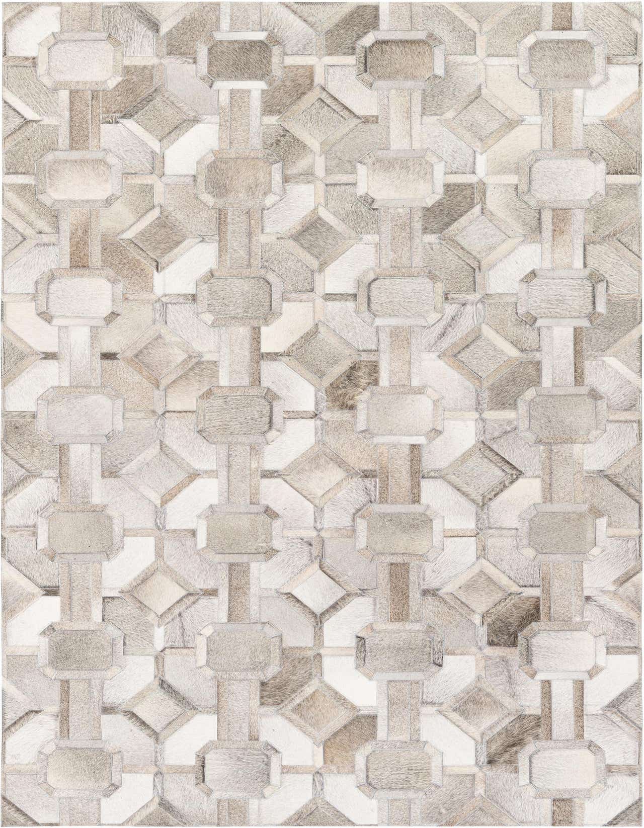 A 5x8 rectangular Cowhide Stocks rug in varying shades of gray and silver, featuring a modern geometric patchwork design.