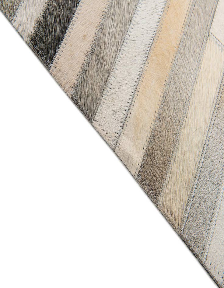 Detail image of  5' 1 x 8' Cowhide Stocks Rug