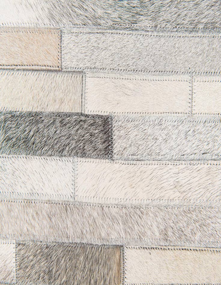 Detail image of  5' 1 x 8' Cowhide Stocks Rug