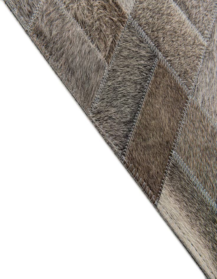 Detail image of  5' x 7' 10 Cowhide Stocks Rug