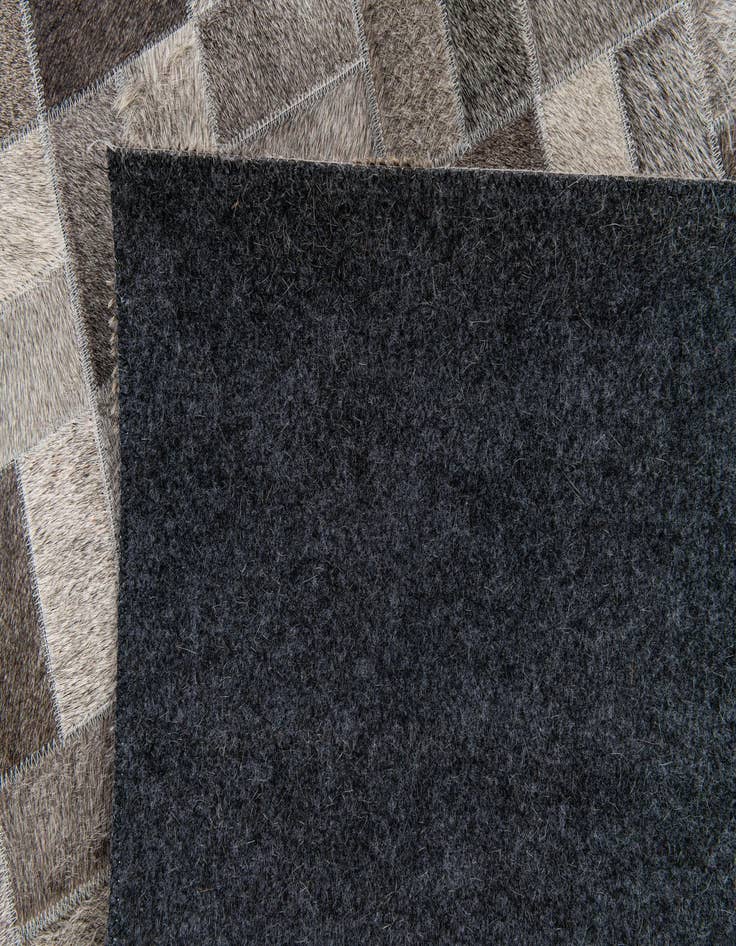 Detail image of  5' x 7' 10 Cowhide Stocks Rug