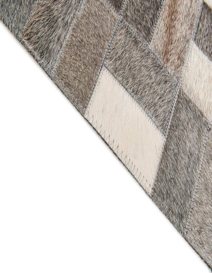 Detail image of  4' 11 x 7' 11 Cowhide Stocks Rug