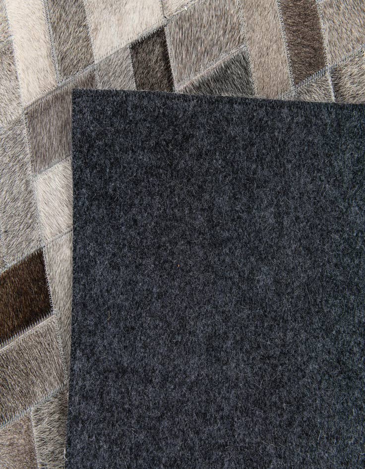 Detail image of  4' 11 x 7' 11 Cowhide Stocks Rug