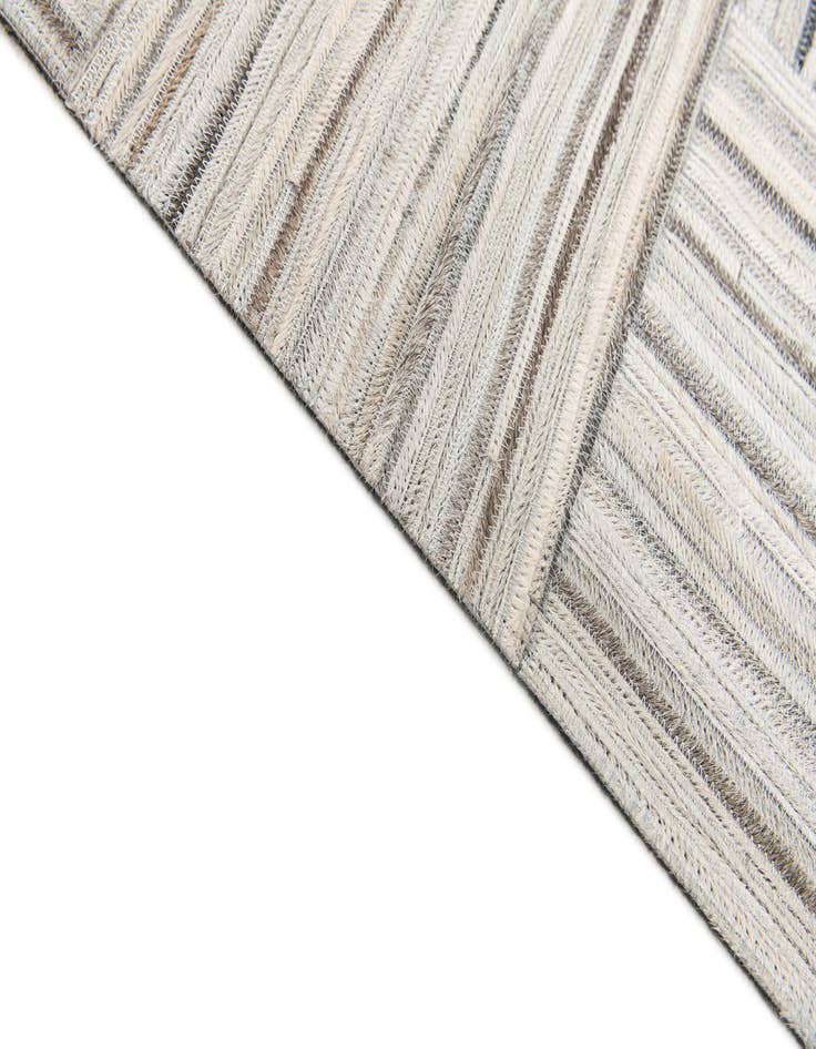 Detail image of  4' 11 x 8' 2 Cowhide Stocks Rug