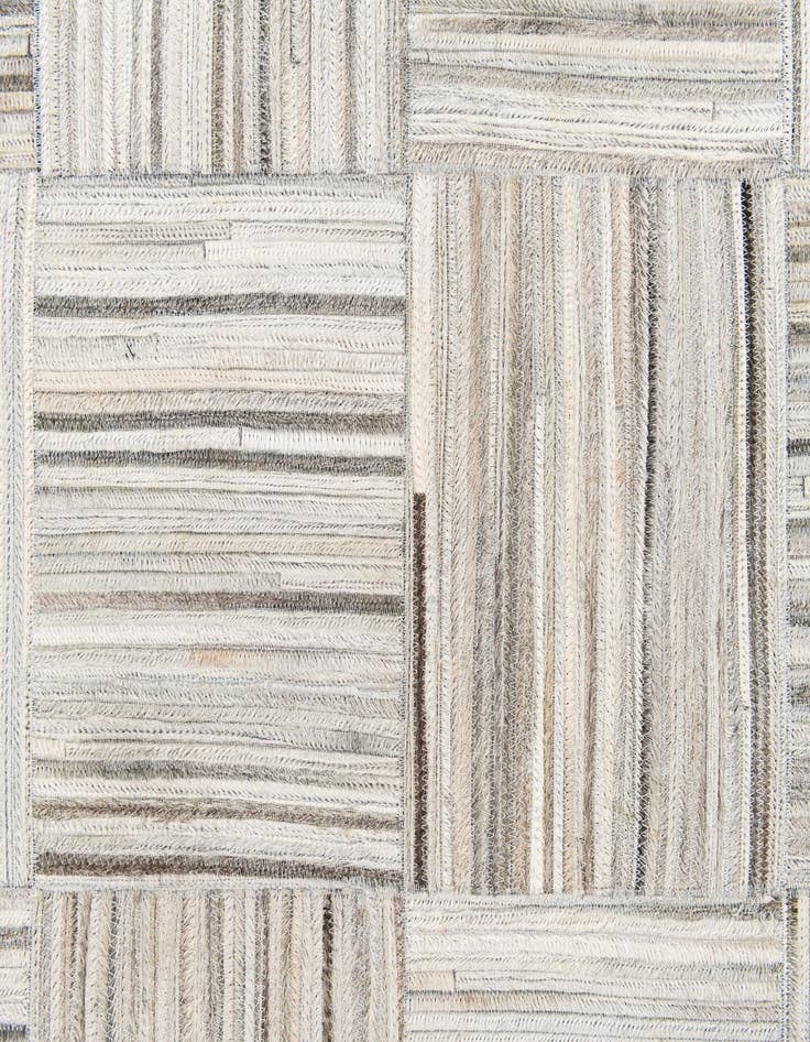 Detail image of  4' 11 x 8' 2 Cowhide Stocks Rug