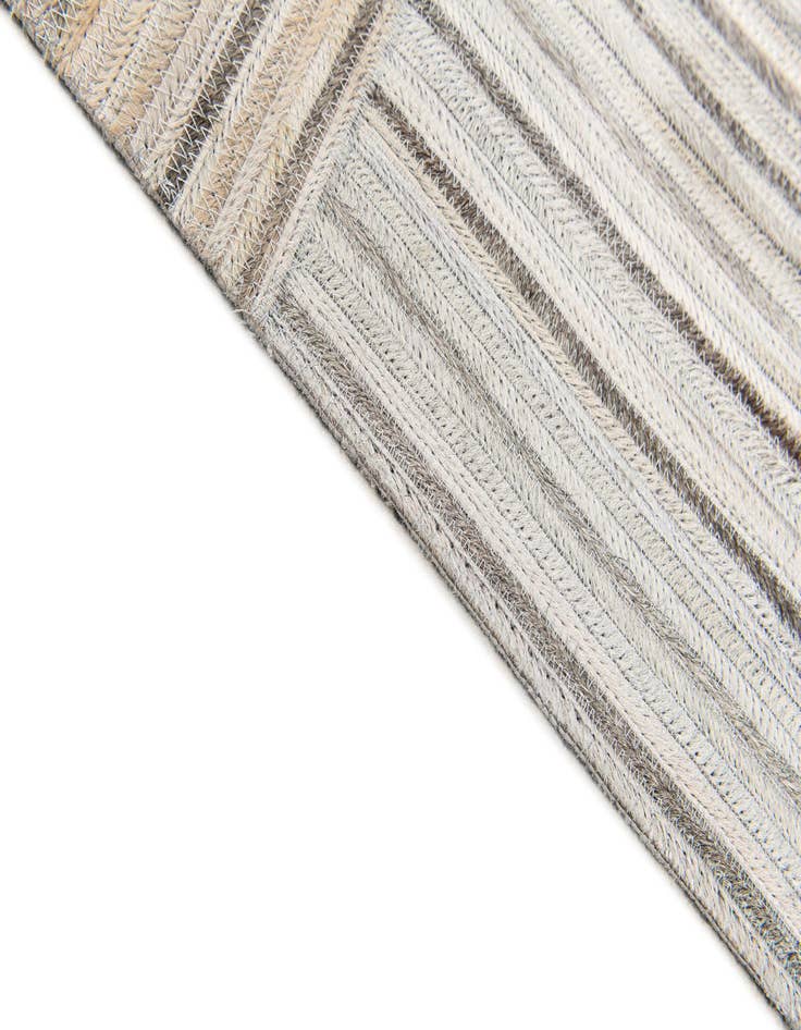 Detail image of  5' x 8' 3 Cowhide Stocks Rug