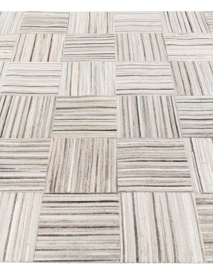 Detail image of  4' 11 x 8' 2 Cowhide Stocks Rug