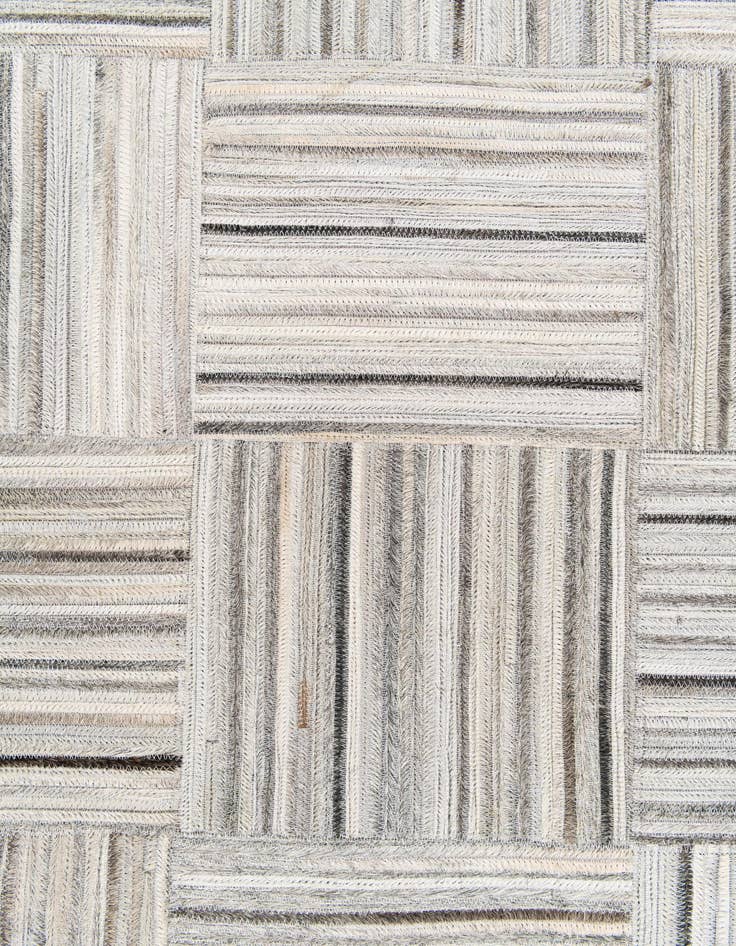 Detail image of  4' 11 x 8' 2 Cowhide Stocks Rug