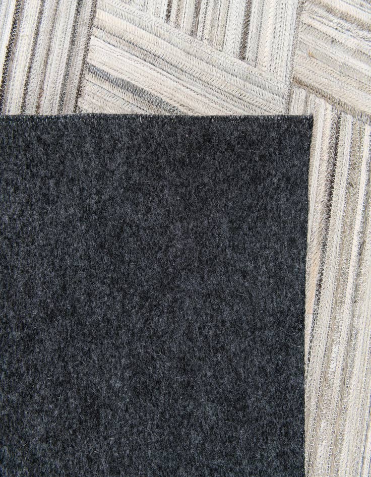 Detail image of  4' 11 x 8' 2 Cowhide Stocks Rug