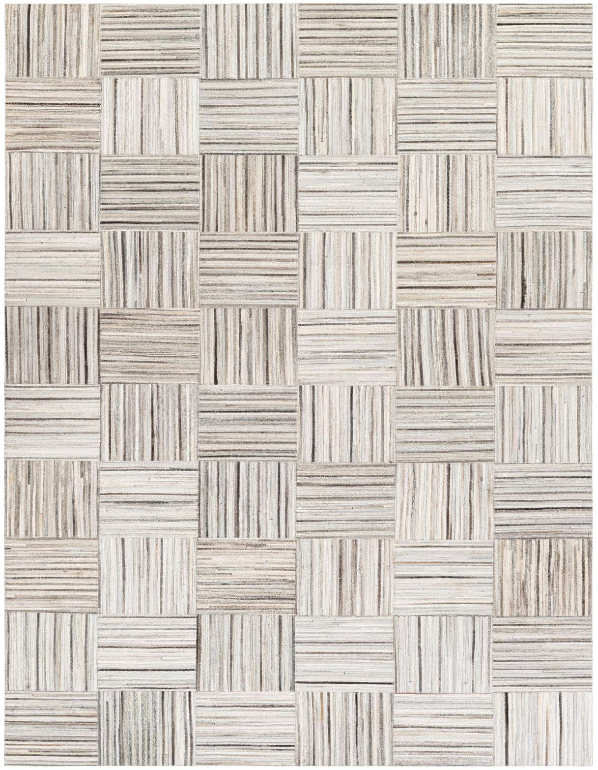 A 5x8 rectangular Cowhide Stocks rug featuring a modern gray and silver striped patchwork design, ideal for a living room.