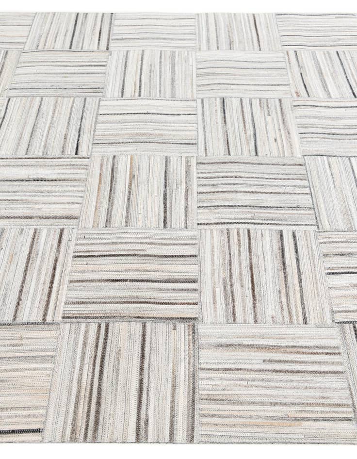 Detail image of  4' 11 x 8' 2 Cowhide Stocks Rug