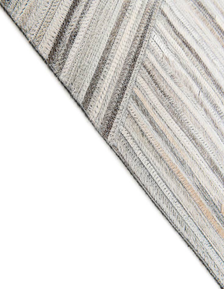 Detail image of  4' 11 x 8' 2 Cowhide Stocks Rug