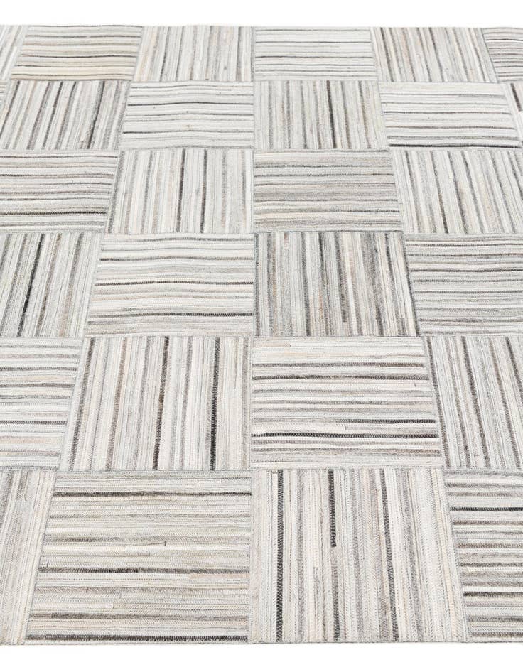 Detail image of  4' 11 x 8' 2 Cowhide Stocks Rug