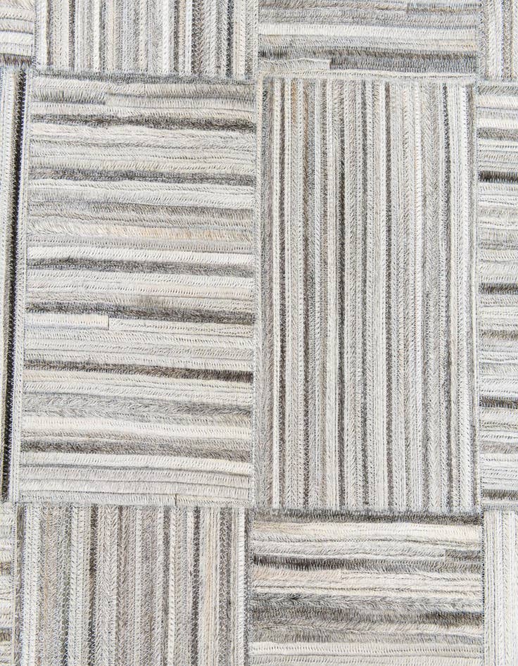 Detail image of  4' 11 x 8' 2 Cowhide Stocks Rug