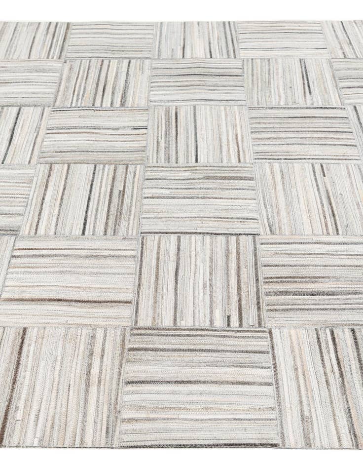 Detail image of  4' 11 x 8' 2 Cowhide Stocks Rug