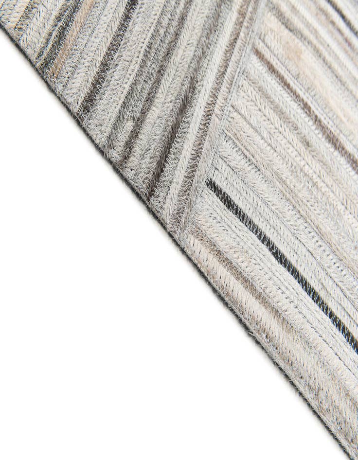 Detail image of  4' 11 x 8' 2 Cowhide Stocks Rug