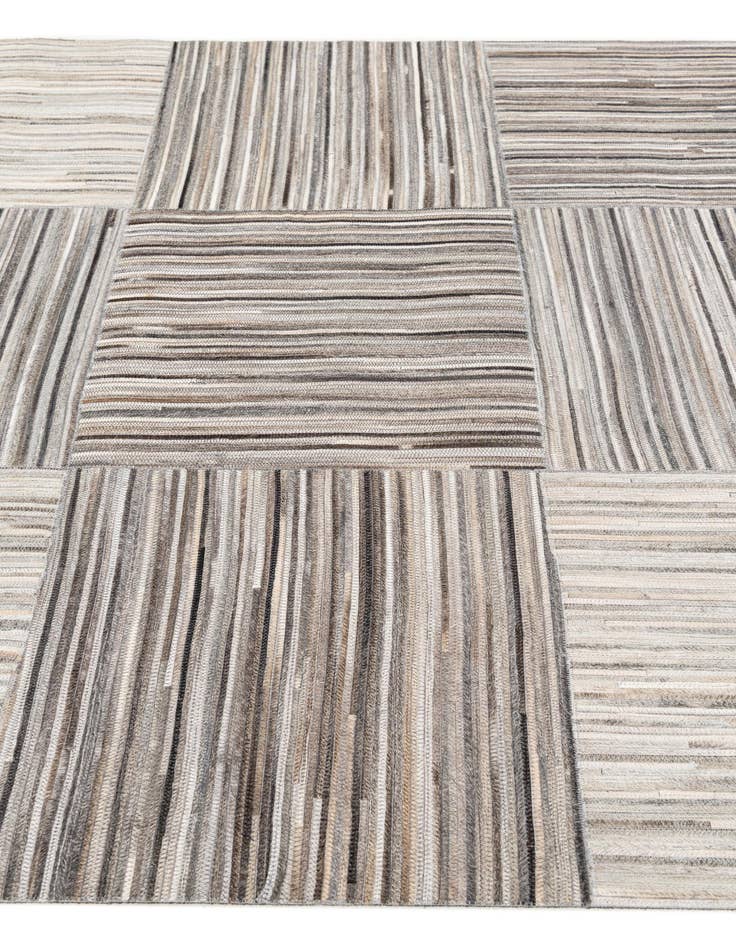 Detail image of  4' 11 x 8' 1 Cowhide Stocks Rug