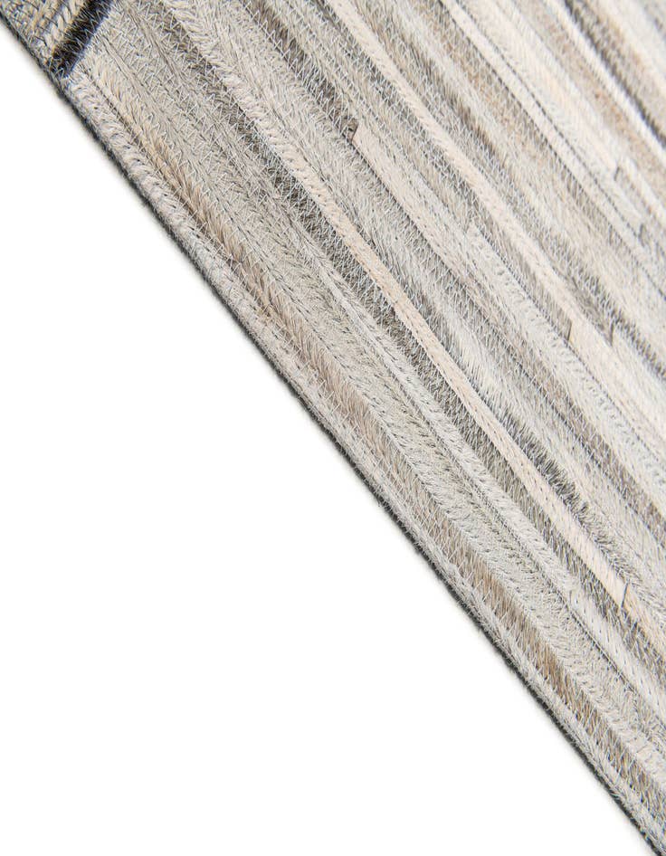 Detail image of  4' 11 x 8' 1 Cowhide Stocks Rug