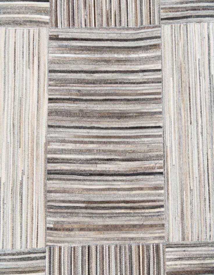 Detail image of  4' 11 x 8' 1 Cowhide Stocks Rug