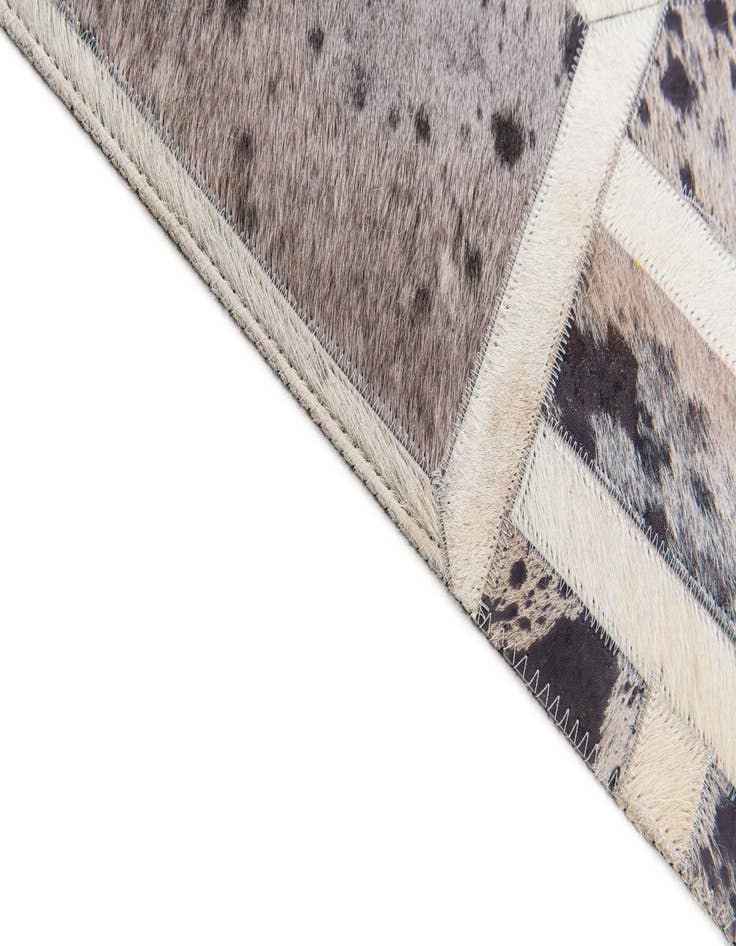 Detail image of  4' 11 x 8' Cowhide Stocks Rug