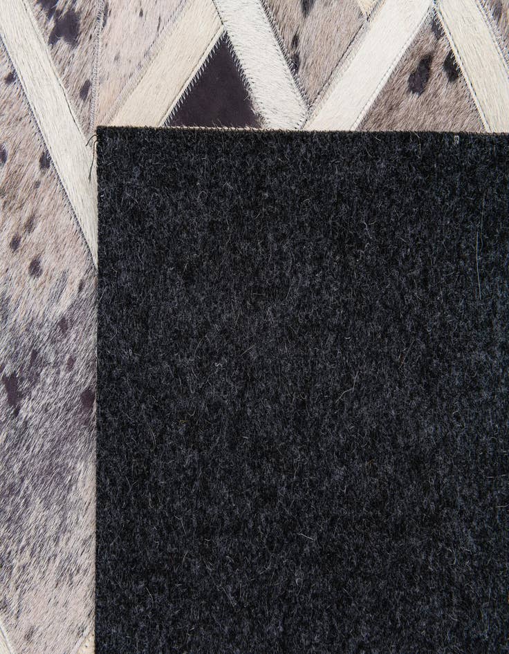 Detail image of  4' 11 x 8' Cowhide Stocks Rug