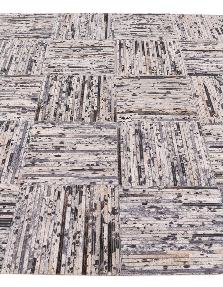 Detail image of  4' 11 x 7' 10 Cowhide Stocks Rug