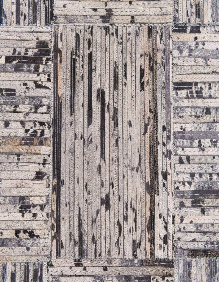 Detail image of  4' 11 x 7' 10 Cowhide Stocks Rug