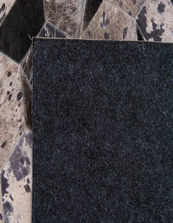 Detail image of  5' 1 x 8' Cowhide Stocks Rug