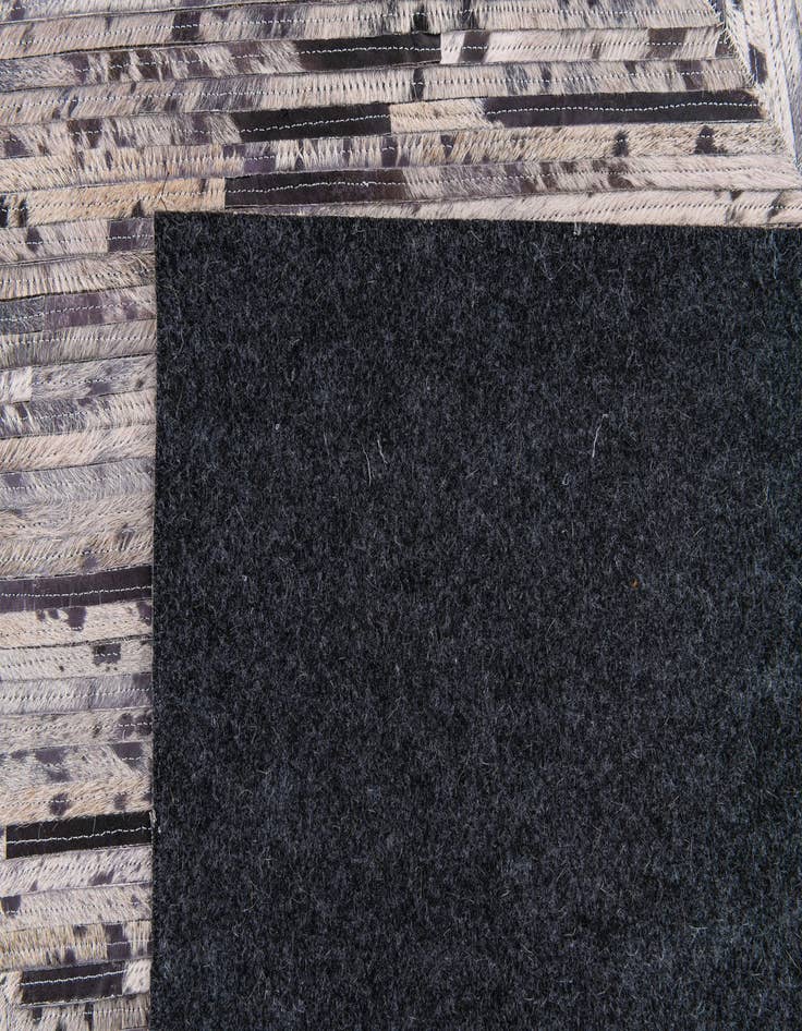 Detail image of  5' x 8' Cowhide Stocks Rug
