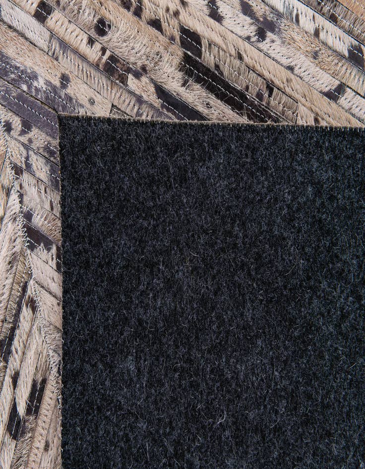 Detail image of  5' 1 x 8' 2 Cowhide Stocks Rug