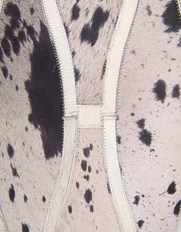 Detail image of  4' 11 x 7' 9 Cowhide Stocks Rug