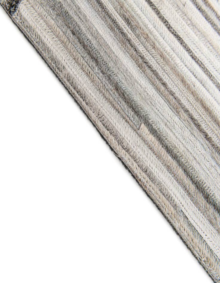 Detail image of  5' x 8' 3 Cowhide Stocks Rug