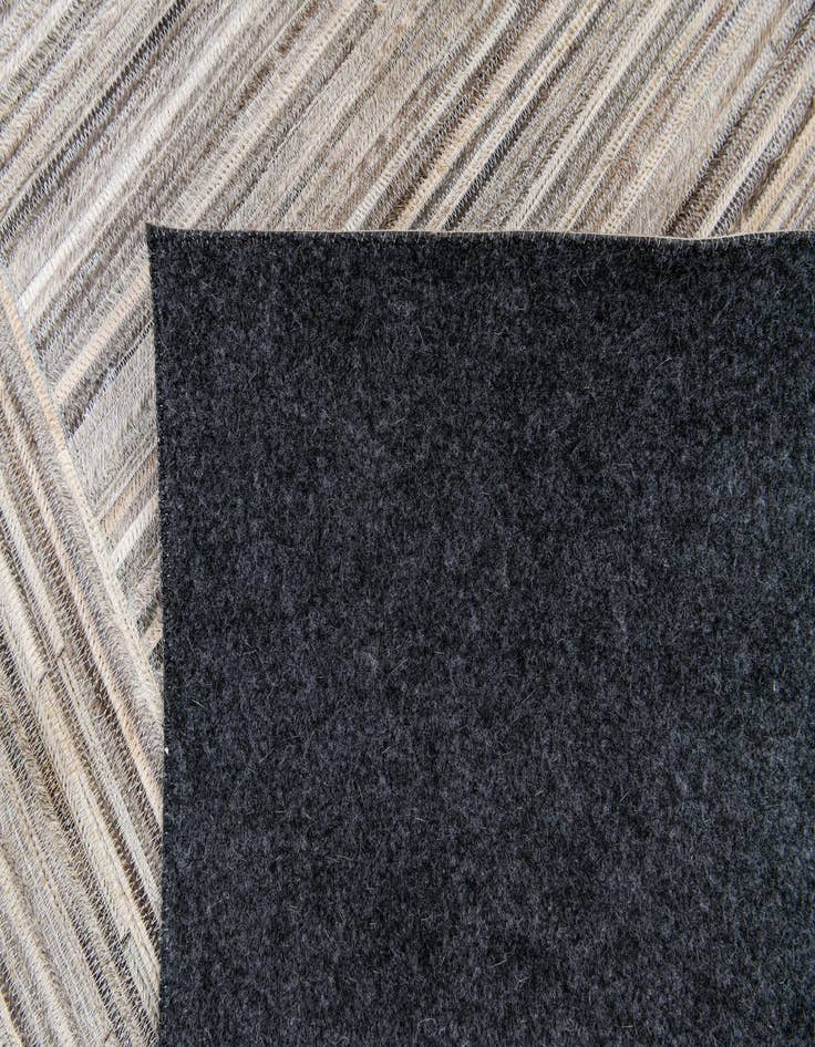 Detail image of  5' x 8' 3 Cowhide Stocks Rug