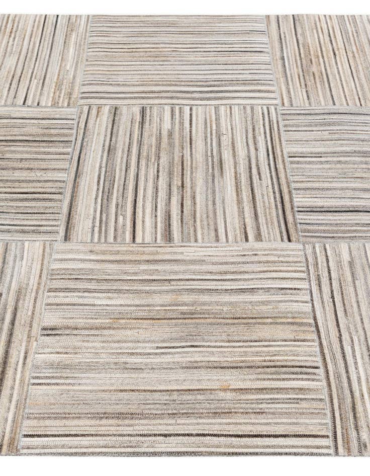 Detail image of  4' 11 x 8' 2 Cowhide Stocks Rug