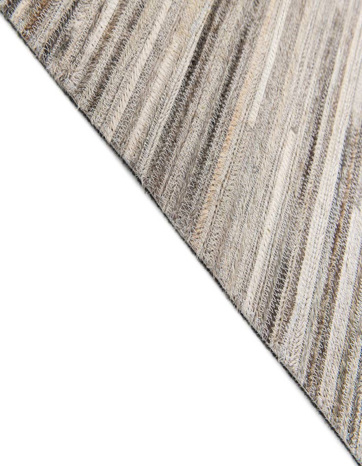 Detail image of  4' 11 x 8' 2 Cowhide Stocks Rug