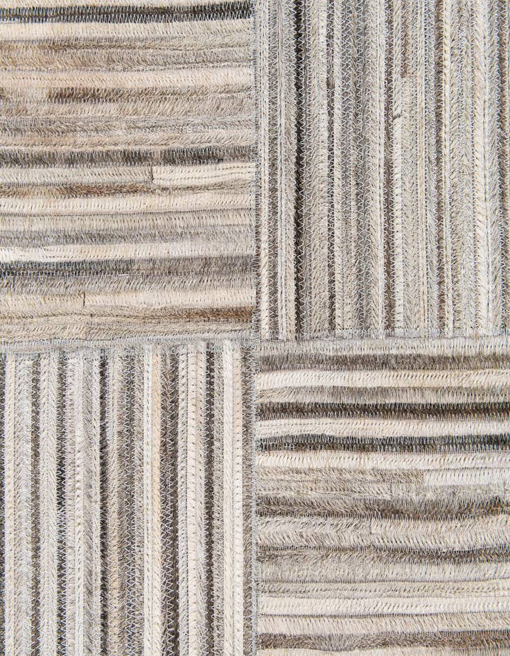 Detail image of  4' 11 x 8' 2 Cowhide Stocks Rug