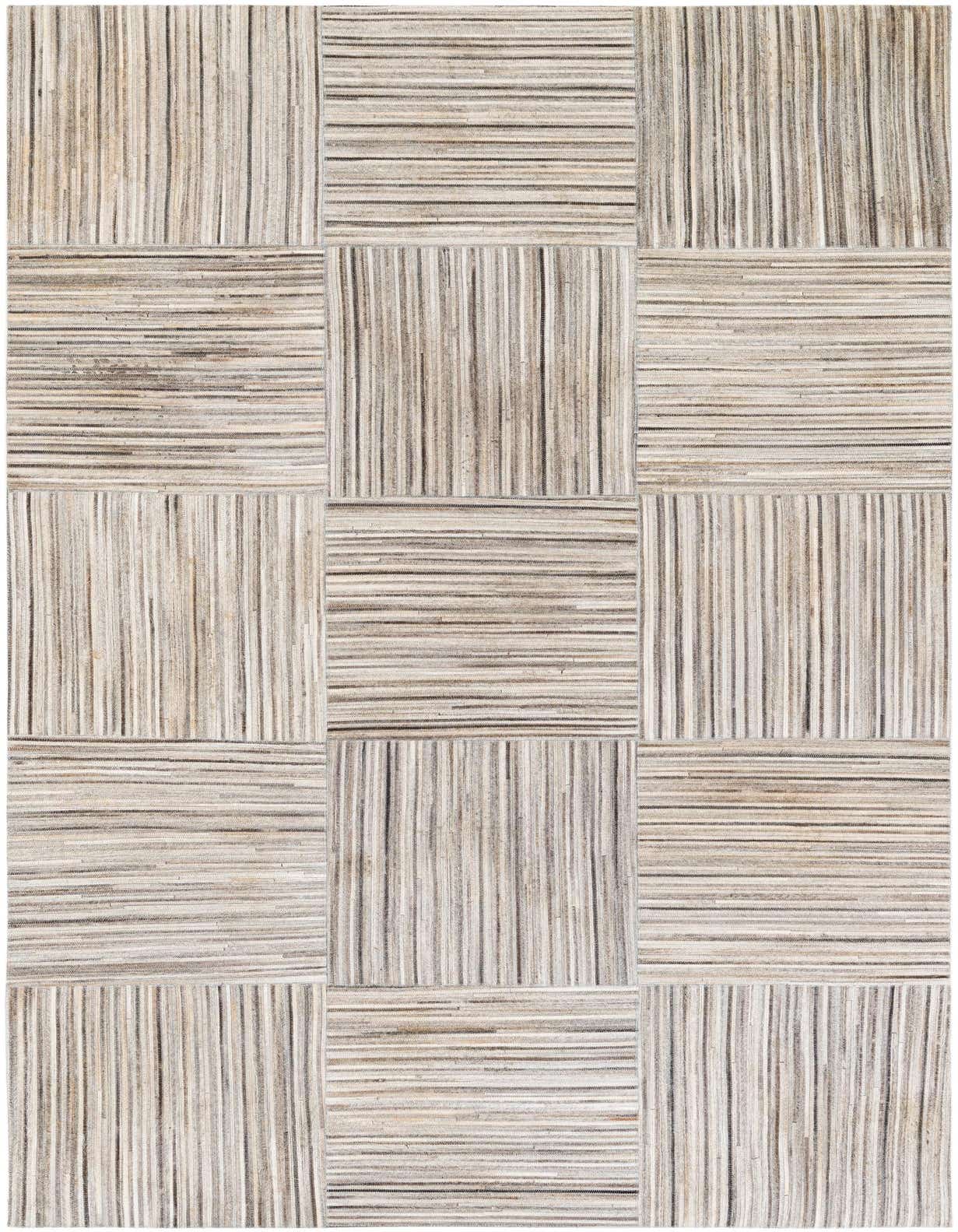 A 5x8 rectangular gray modern rug featuring a unique striped cowhide and leather patchwork design, ideal for a living room.