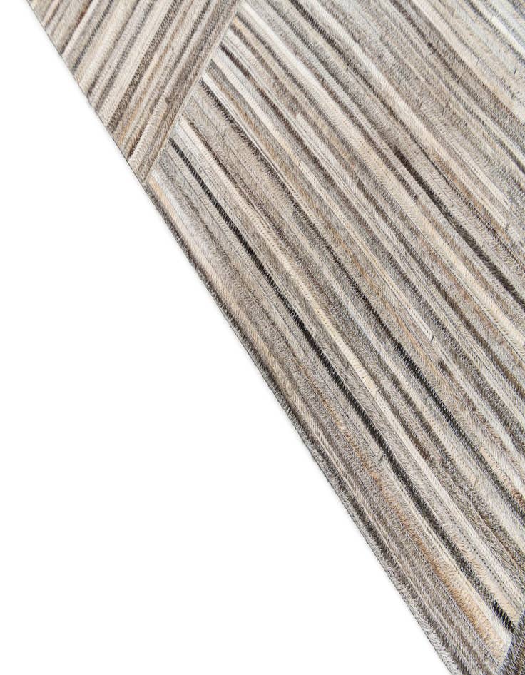 Detail image of  4' 11 x 8' 3 Cowhide Stocks Rug