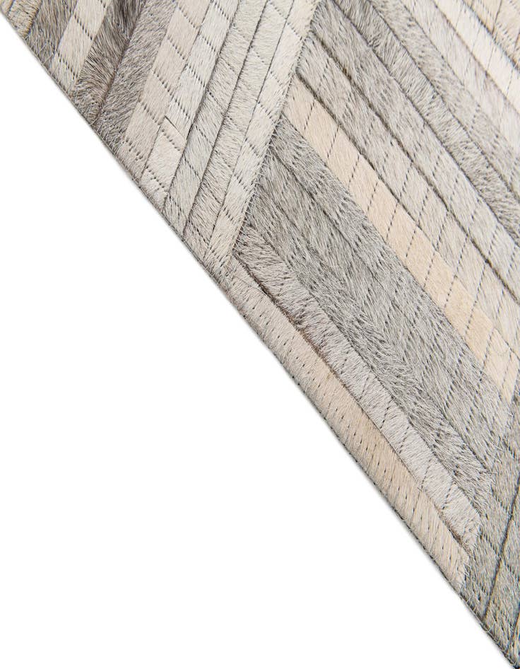 Detail image of  4' 1 x 6' 1 Cowhide Stocks Rug