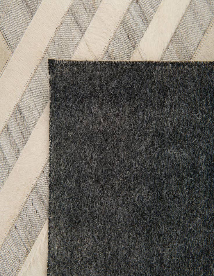 Detail image of  8' 1 x 9' 11 Cowhide Stocks Rug