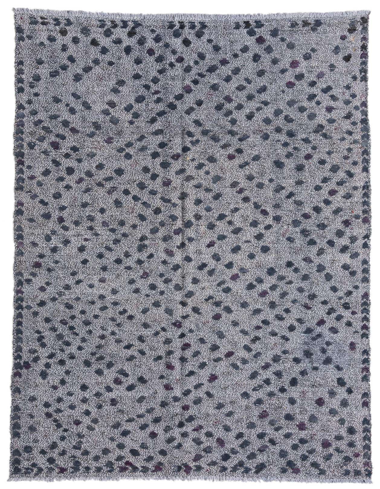 A 5x8 rectangular Darya rug in shades of gray and silver with an abstract, modern pattern of dark flecks, suitable for a living room.