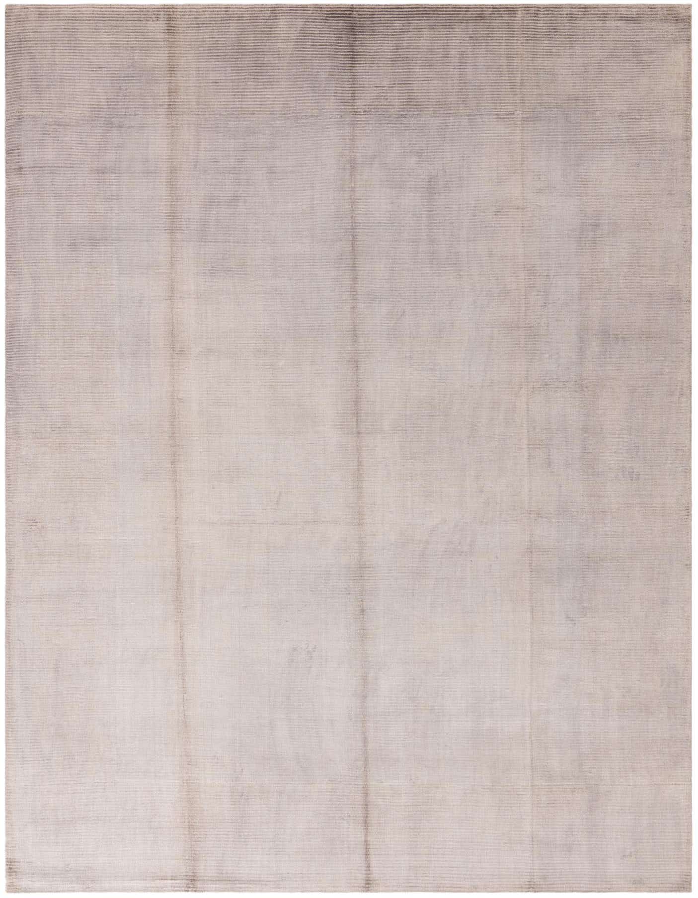 A large 8x11 rectangular Darya Collection rug in varying shades of gray, featuring a subtle striped texture, perfect for a modern living room.