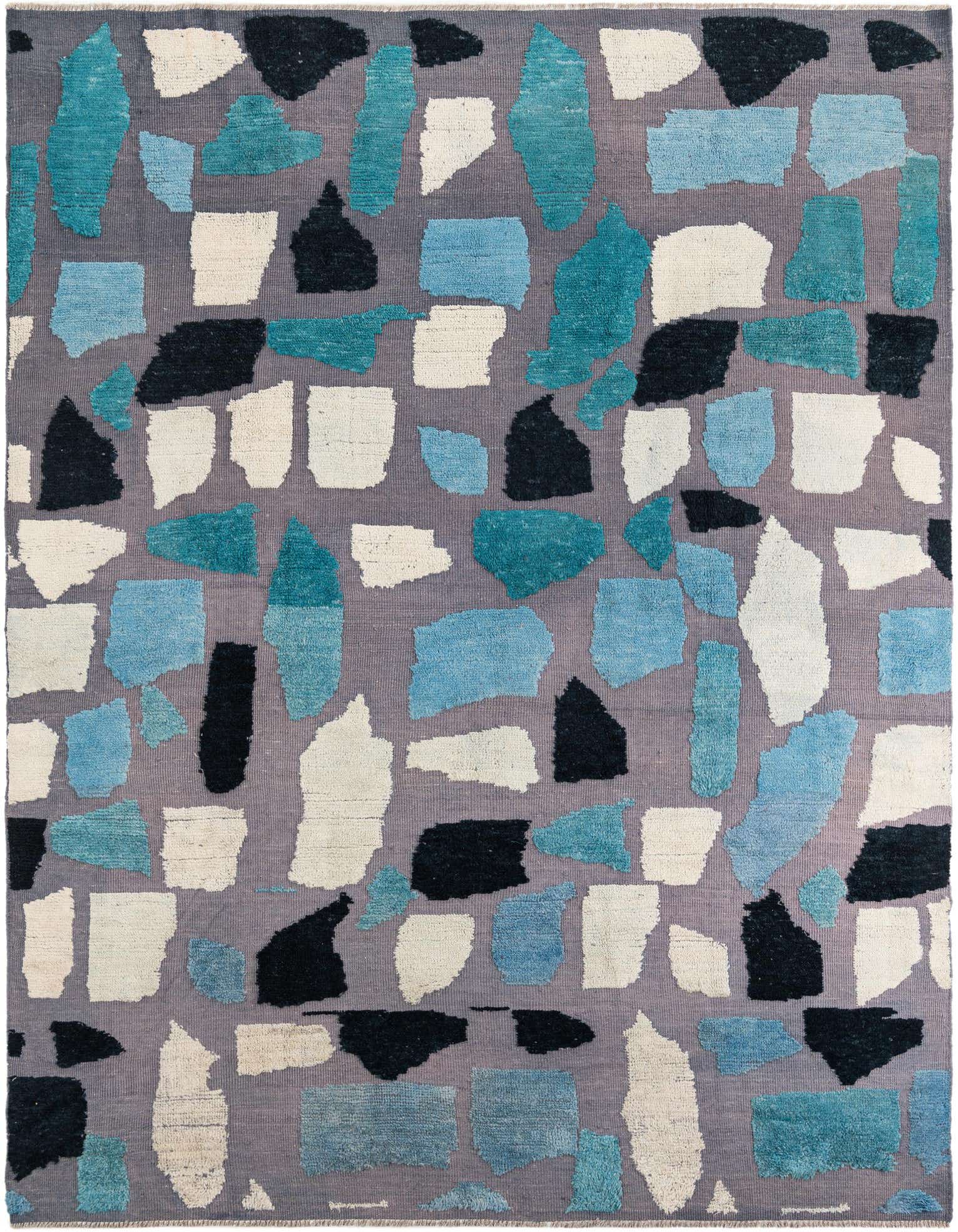 A rectangular 8x10 Darya wool rug featuring a modern abstract pattern of various sized shapes in teal, light blue, black, and cream on a gray background.