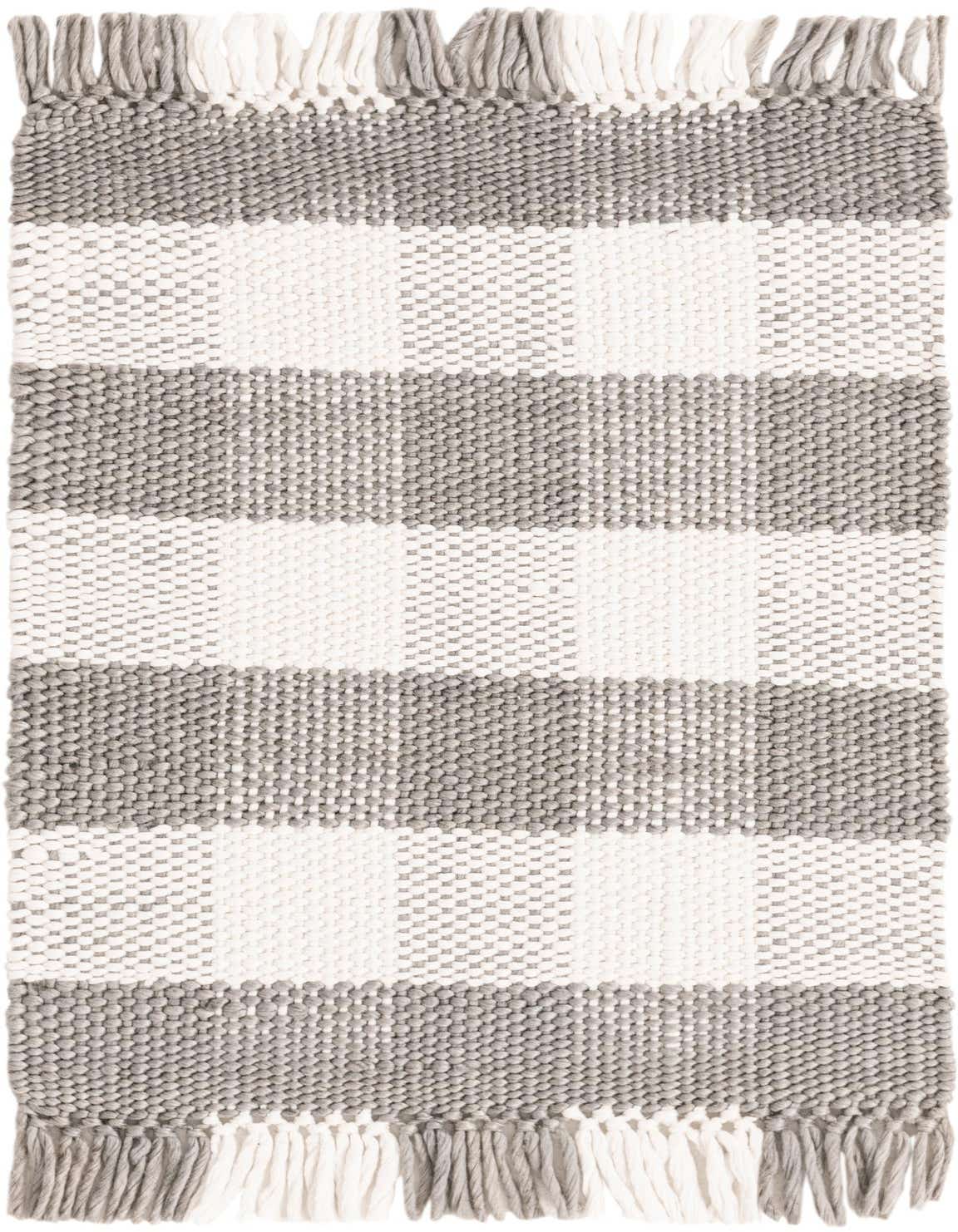 A 2x3 rectangular Eco Plaid rug featuring alternating gray and white textured stripes with fringe, suitable for indoor or outdoor use.
