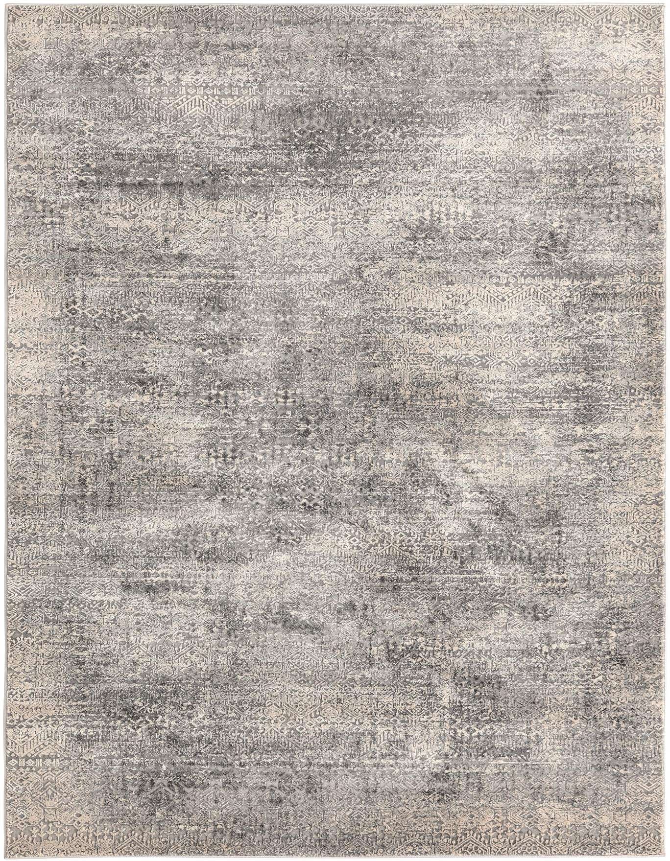 A 5x8 rectangular gray and silver modern area rug with a subtle distressed pattern and high-low textured pile.