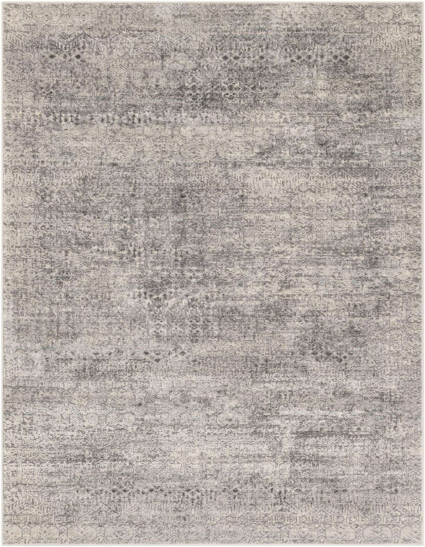 A 5x7 rectangular gray and silver area rug featuring a distressed, abstract pattern with subtle geometric motifs, suitable for a modern living space.